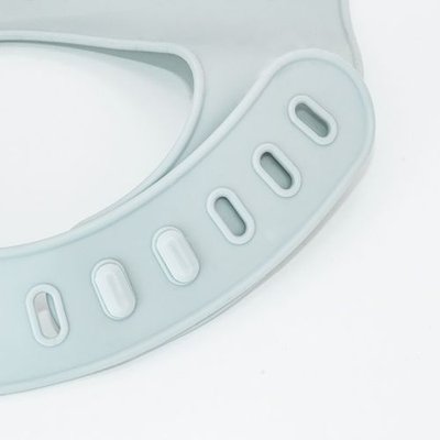 Babero ajustable de silicona con recogemigas
