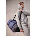 Bolsa de deporte con alfombra reposapiés