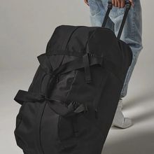 Bolsa de viaje con ruedas y mango Black