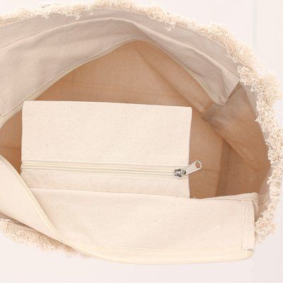 Bolsa con flecos y cremallera
