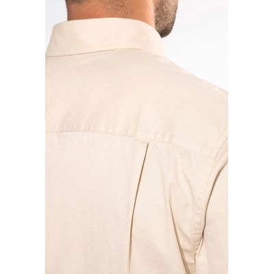 Camisa de algodón con bolsillo y cuello con botones