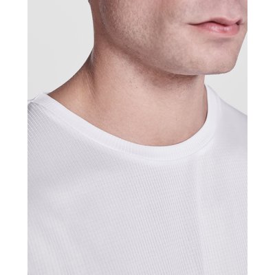 Camiseta técnica con bajo trasero más largo