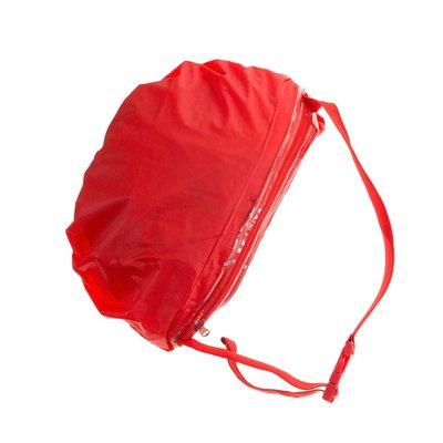 Impermeable convertible en riñonera