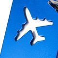 Llavero abridor forma avión