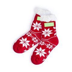 Par de calcetines hogareños antideslizantes y motivos navideños | En un calcetín en la zona tobillo lateral