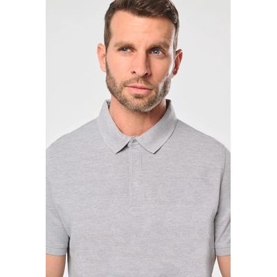 Polo con botones a presión