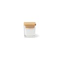 Vela perfumada en vaso de cristal con tapa
