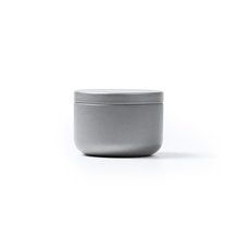 Vela aromática floral en recipiente metálico Plata