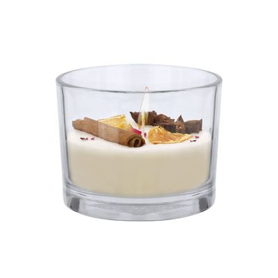 Vela con aroma a canela y cítricos