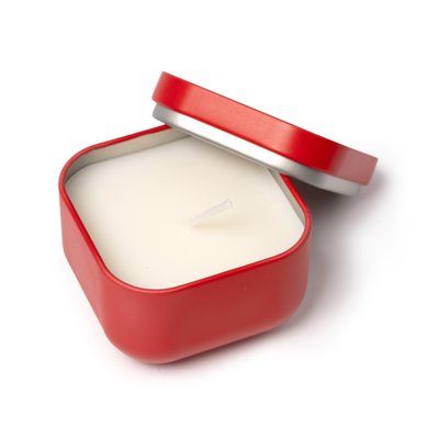 Vela aromática en recipiente metálico