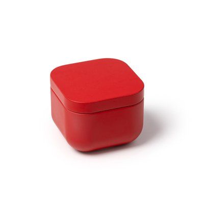 Vela aromática en recipiente metálico