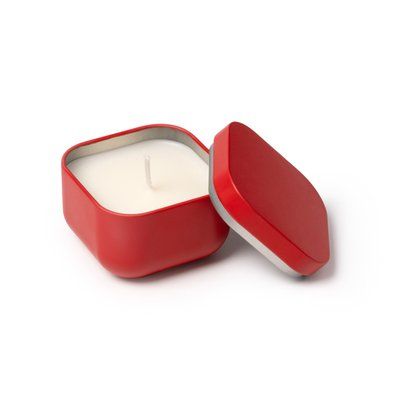 Vela aromática en recipiente metálico