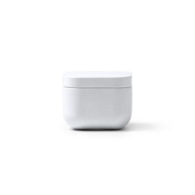 Vela aromática en recipiente metálico