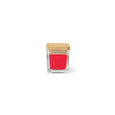 Vela perfumada en vaso de cristal con tapa
