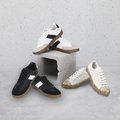 Zapatilla de piel suave y suela acolchada